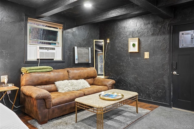 living room with beamed ceiling, cooling unit, and hardwood / wood-style floors