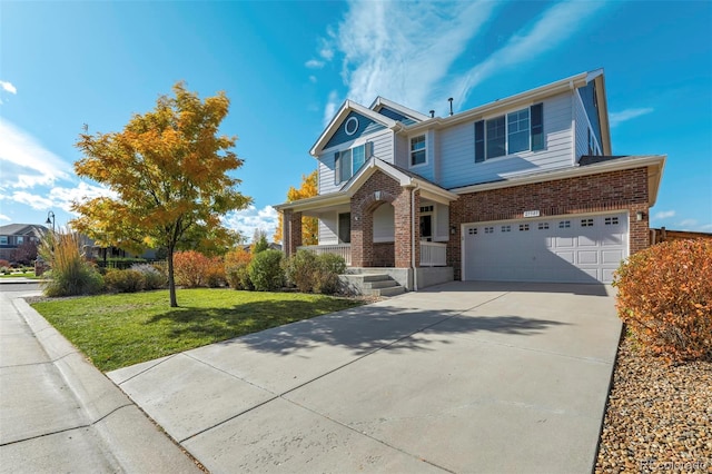 view of front facade with a front lawn and a garage