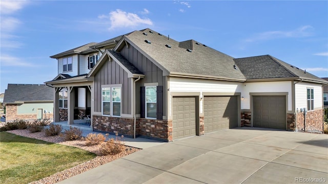 craftsman house with a garage