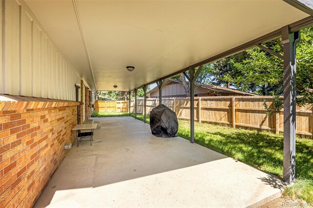 12475 W 38th Ave, Wheat Ridge, CO 80033 - fenced backyard with a patio and area for grilling