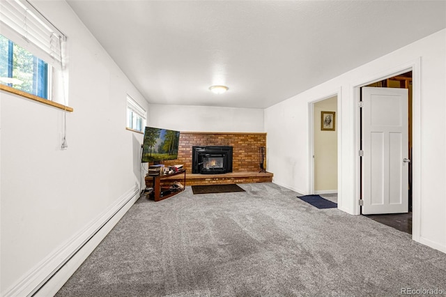 12475 W 38th Ave, Wheat Ridge, CO 80033 - living room featuring carpet, baseboard heating, and a brick fireplace