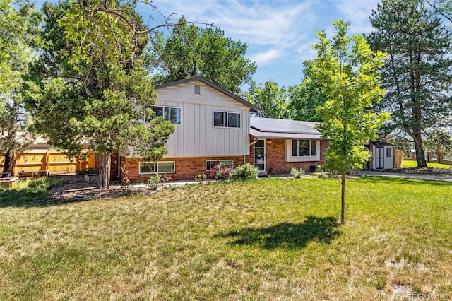 12475 W 38th Ave, Wheat Ridge, CO 80033 - split level home featuring brick siding and solar panels