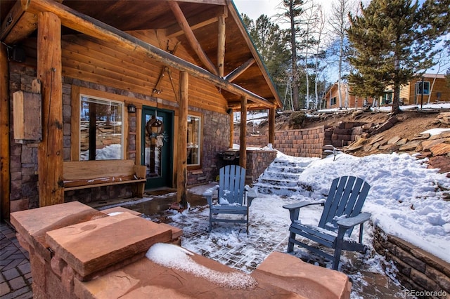 526 Wakanda Trl, Woodland Park, CO 80863 - view of snow covered patio