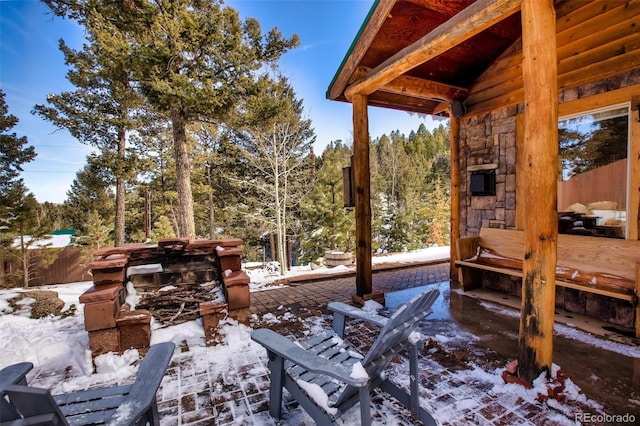 526 Wakanda Trl, Woodland Park, CO 80863 - snow covered patio with fence