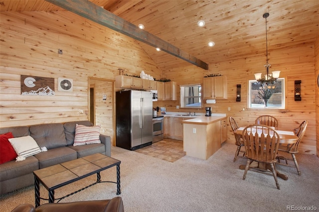 526 Wakanda Trl, Woodland Park, CO 80863 - kitchen featuring wooden walls, stainless steel appliances, light brown cabinets, and wood ceiling