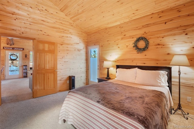 526 Wakanda Trl, Woodland Park, CO 80863 - carpeted bedroom featuring lofted ceiling, wooden walls, and wood ceiling