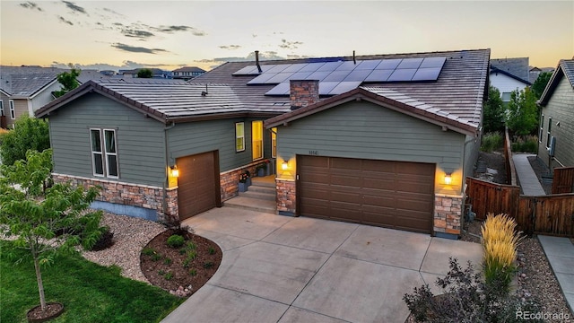 view of front of house with solar panels