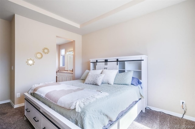 bedroom with baseboards and dark carpet
