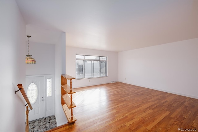 foyer with hardwood / wood-style floors