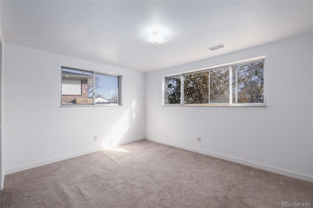 view of carpeted spare room