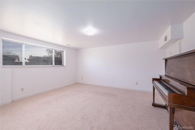 interior space featuring light colored carpet