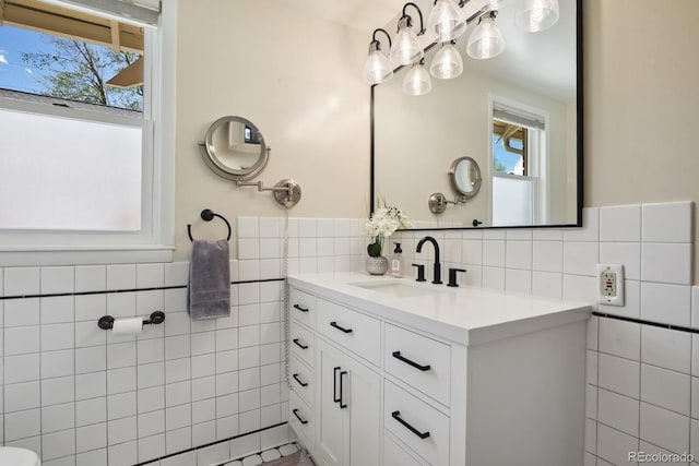 916 Adams St, Denver, CO 80206 - bathroom with tile walls and vanity