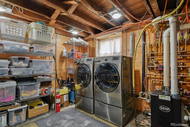 916 Adams St, Denver, CO 80206 - laundry room with washer and dryer and a heating unit
