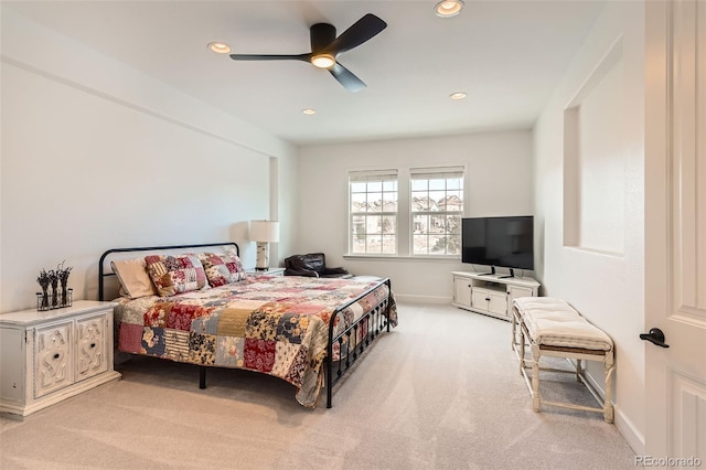 carpeted bedroom featuring ceiling fan