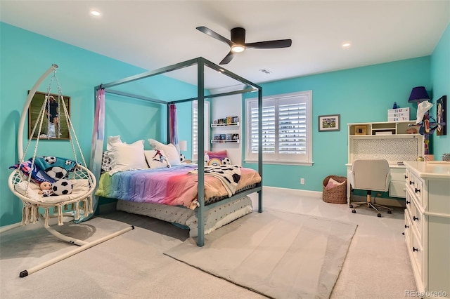 carpeted bedroom with ceiling fan