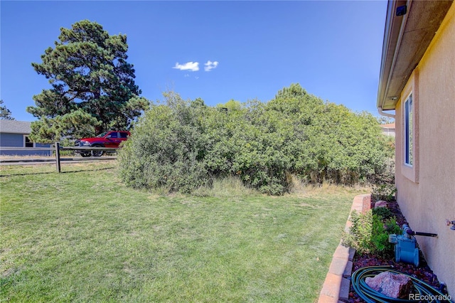 view of yard featuring fence