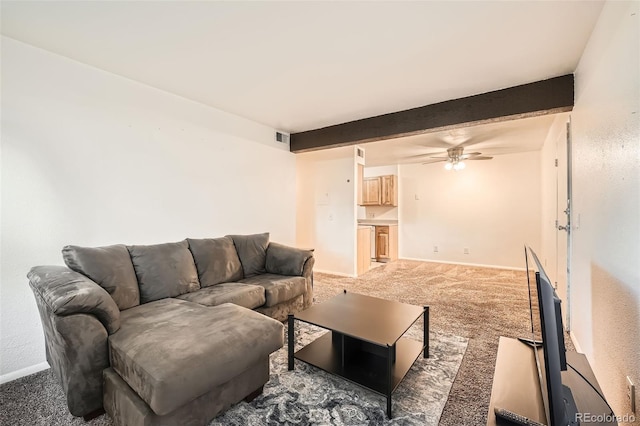 16259 W 10th Ave Unit K1, Golden, CO 80401 - carpeted living area featuring a ceiling fan and beamed ceiling