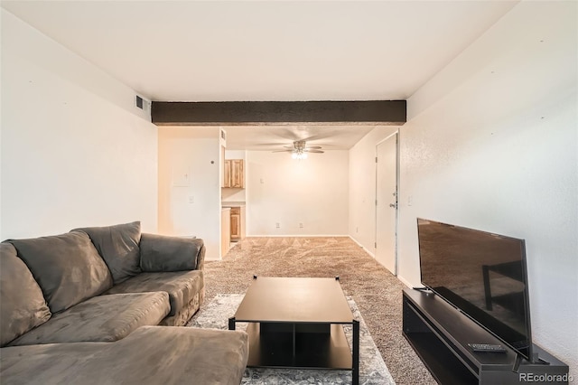 16259 W 10th Ave Unit K1, Golden, CO 80401 - living area with carpet, ceiling fan, and beam ceiling