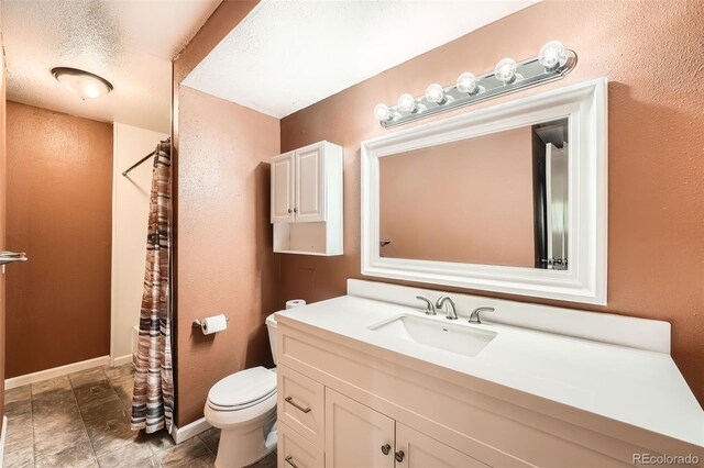 16259 W 10th Ave Unit K1, Golden, CO 80401 - bathroom with vanity and a shower with shower curtain