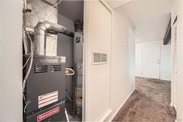 16259 W 10th Ave Unit K1, Golden, CO 80401 - utility room featuring heating unit