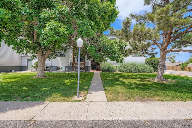 16259 W 10th Ave Unit K1, Golden, CO 80401 - view of front of house with a front lawn