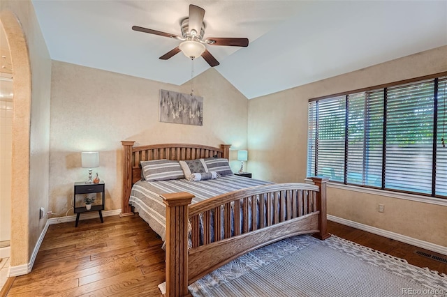 2417 S Racine Way, Aurora, CO 80014 - bedroom with hardwood / wood-style floors, lofted ceiling, and a ceiling fan