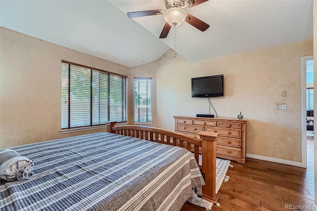 2417 S Racine Way, Aurora, CO 80014 - bedroom featuring lofted ceiling, wood finished floors, and a ceiling fan