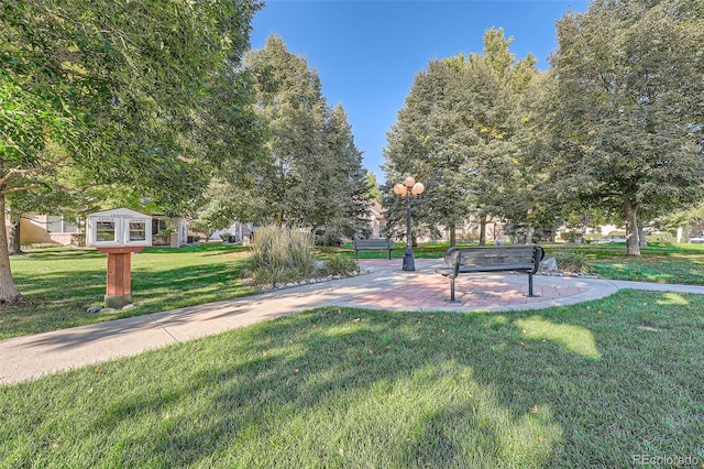 2417 S Racine Way, Aurora, CO 80014 - view of community with a lawn