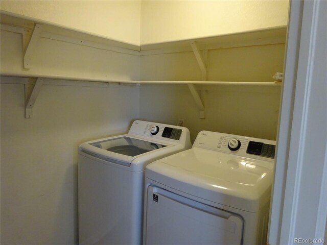 laundry area featuring separate washer and dryer