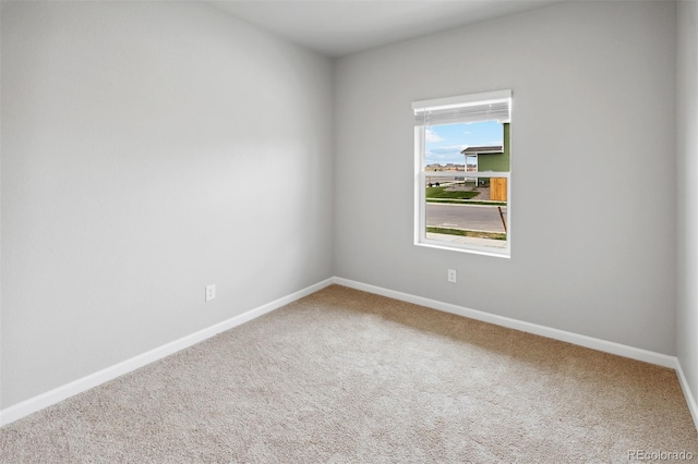 view of carpeted spare room