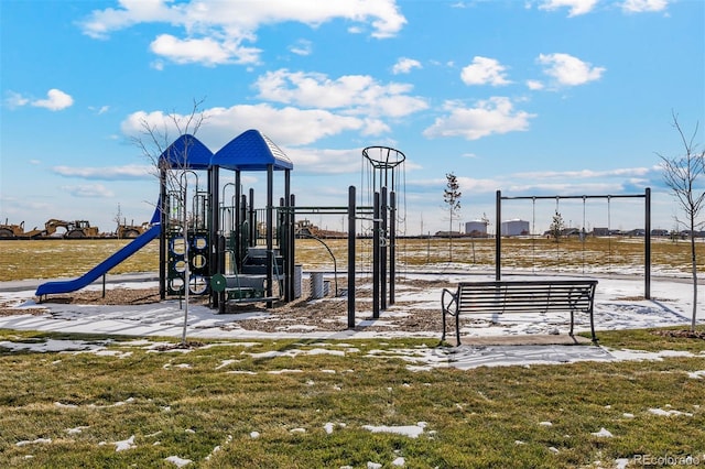 view of jungle gym featuring a lawn