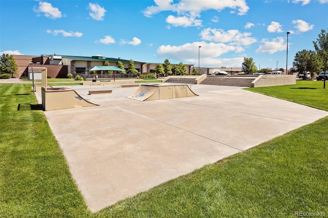 view of home's community with a yard