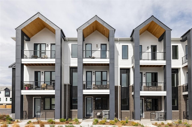 8280 E 36th Ave Unit 26, Denver, CO 80238 - view of front facade featuring brick siding