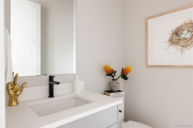 8280 E 36th Ave Unit 26, Denver, CO 80238 - bathroom with vanity and toilet