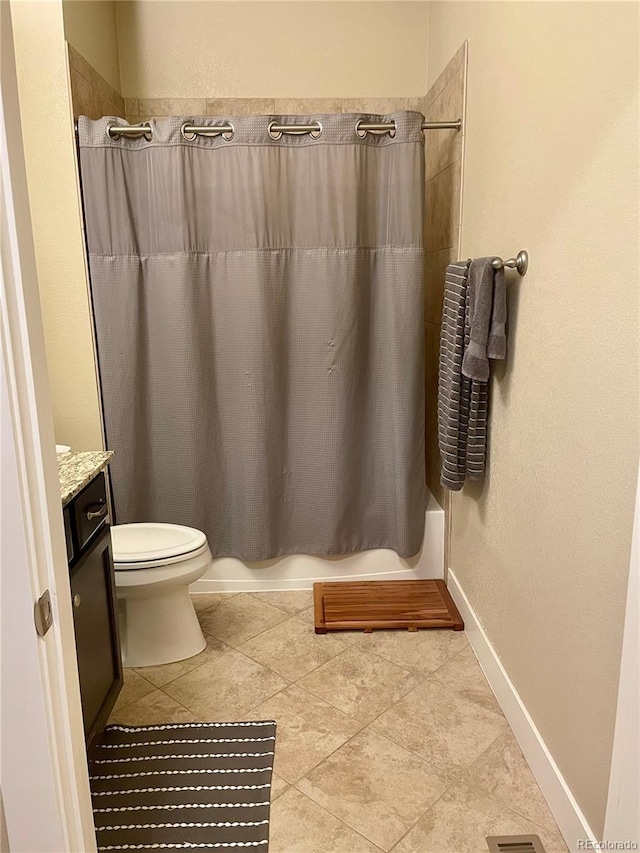 full bathroom featuring toilet, tile patterned floors, vanity, and shower / bathtub combination with curtain