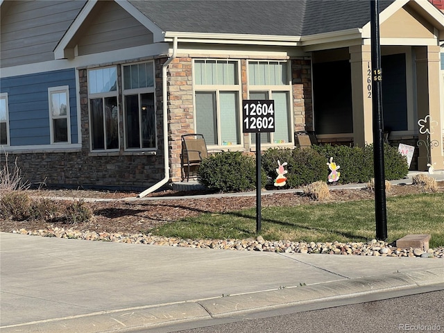 view of home's exterior featuring stone siding