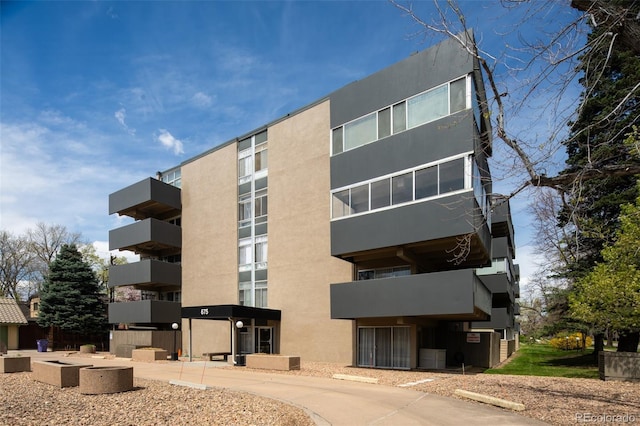 675 S University Blvd Unit 106, Denver, CO 80209 - view of apartment building / complex