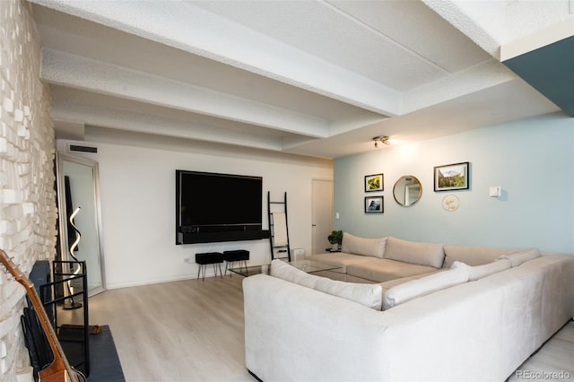 675 S University Blvd Unit 106, Denver, CO 80209 - living area with beamed ceiling and light wood finished floors