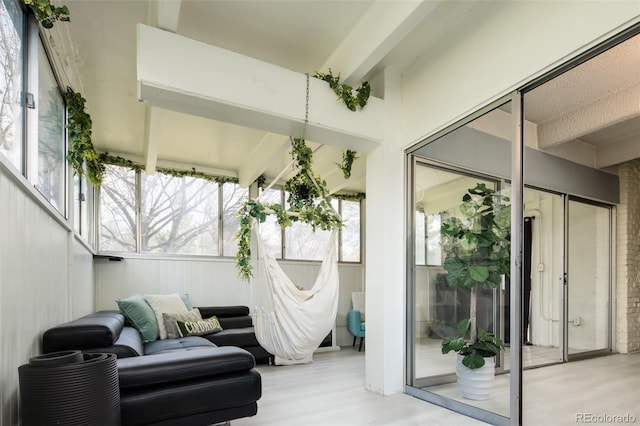 675 S University Blvd Unit 106, Denver, CO 80209 - sunroom featuring wood finished floors and beam ceiling