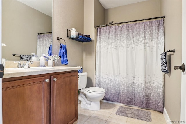 full bath featuring vanity, a shower with shower curtain, tile patterned flooring, and toilet