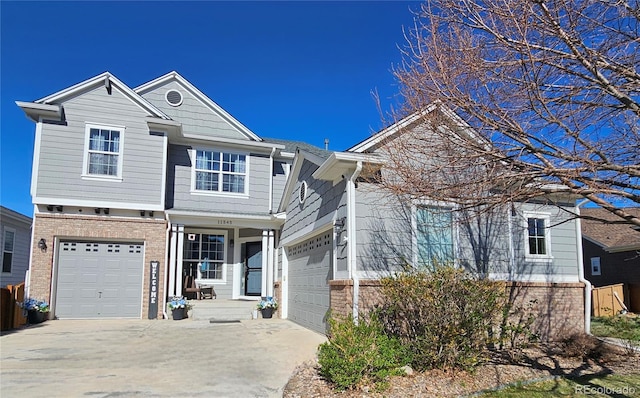 view of front of property with brick siding and driveway