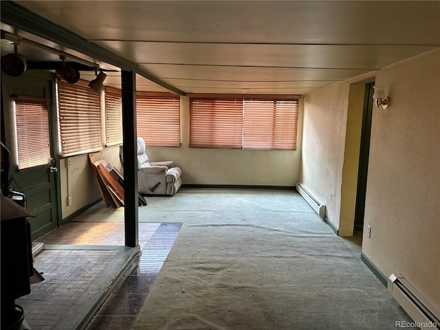 1337 Valentia St, Denver, CO 80220 - unfurnished sunroom featuring baseboard heating