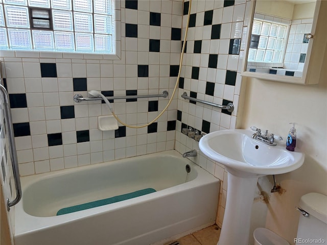 1337 Valentia St, Denver, CO 80220 - full bath featuring toilet and tile patterned floors