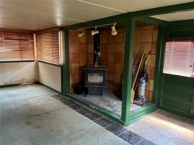 1337 Valentia St, Denver, CO 80220 - interior space with a wood stove