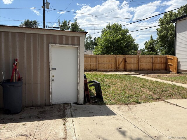 1337 Valentia St, Denver, CO 80220 - view of yard with a storage unit and a patio area