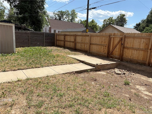 1337 Valentia St, Denver, CO 80220 - fenced backyard with a gate