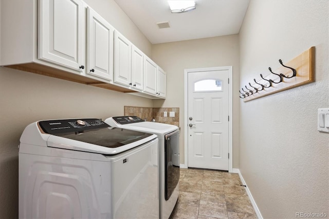 3970 White Bay Dr, Highlands Ranch, CO 80126 - laundry room with separate washer and dryer, cabinet space, and light stone finish flooring