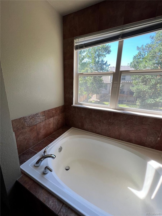 bathroom featuring a garden tub