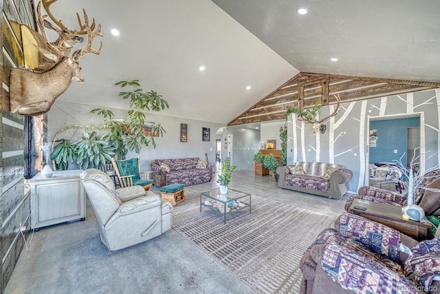 living area with lofted ceiling and recessed lighting