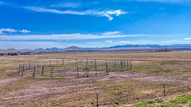 view of mountain feature featuring a rural view